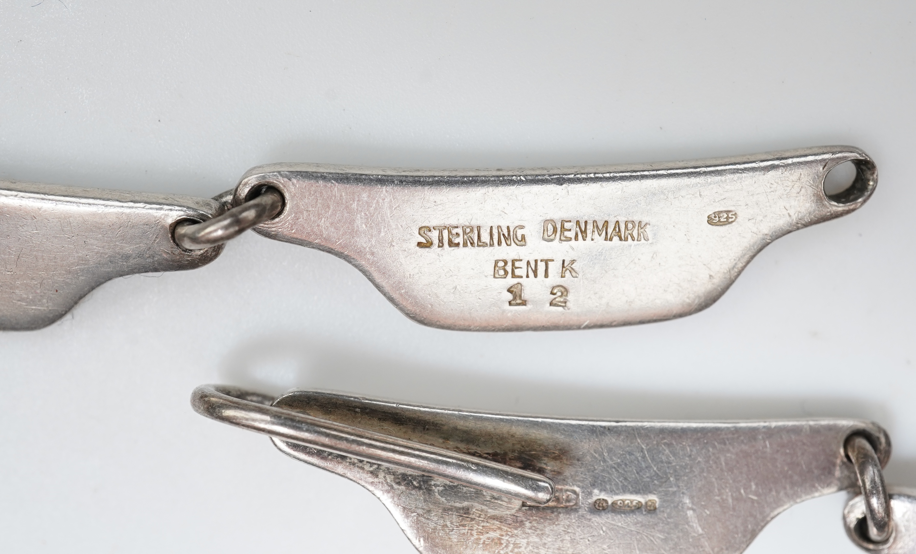 Bent Knudsen, a modernist silver necklace, Denmark, circa 1968, and a silver chain necklace